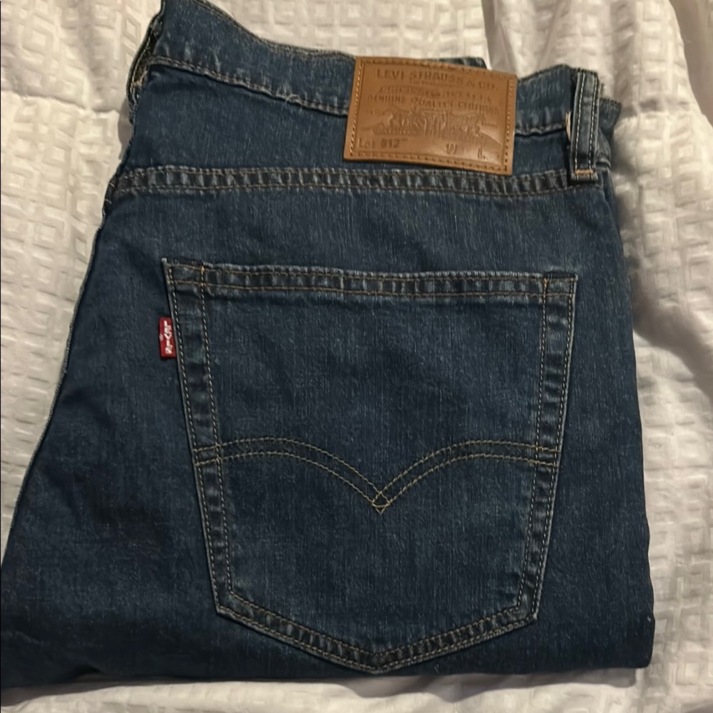 Levi’s 512 strait leg dark wash Blue Jeans marked irregular (run small 34/30)